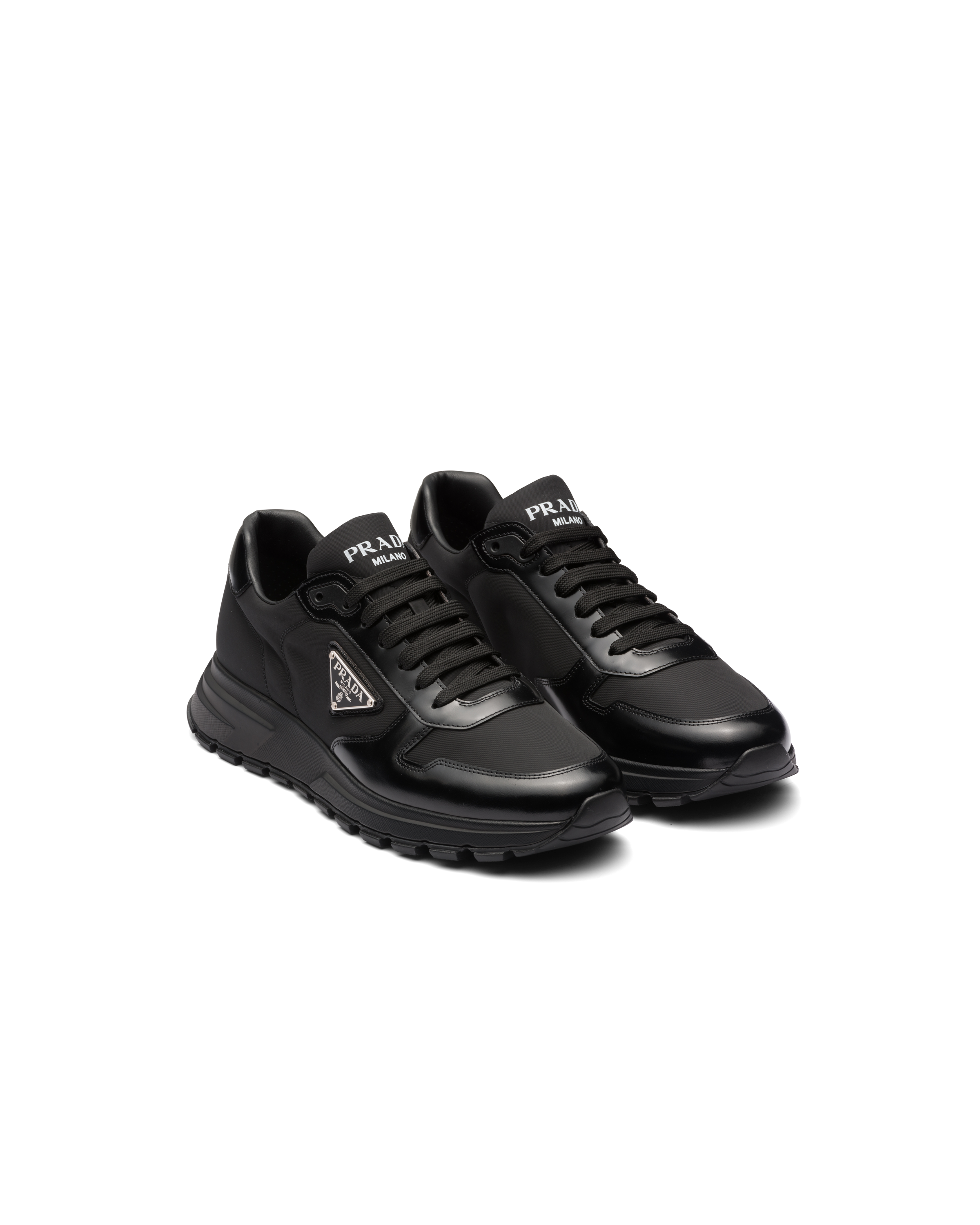 PRADA PRAX 01 RE-NYLON AND BRUSHED LEATHER SNEAKERS 
