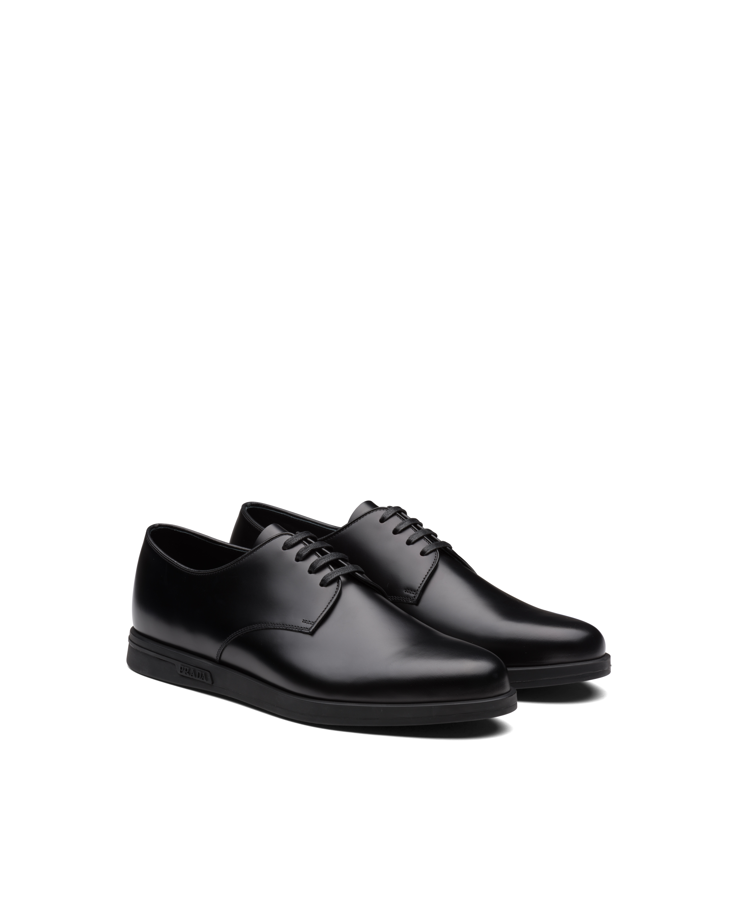 Black Brushed leather derby lace-up shoes | Prada