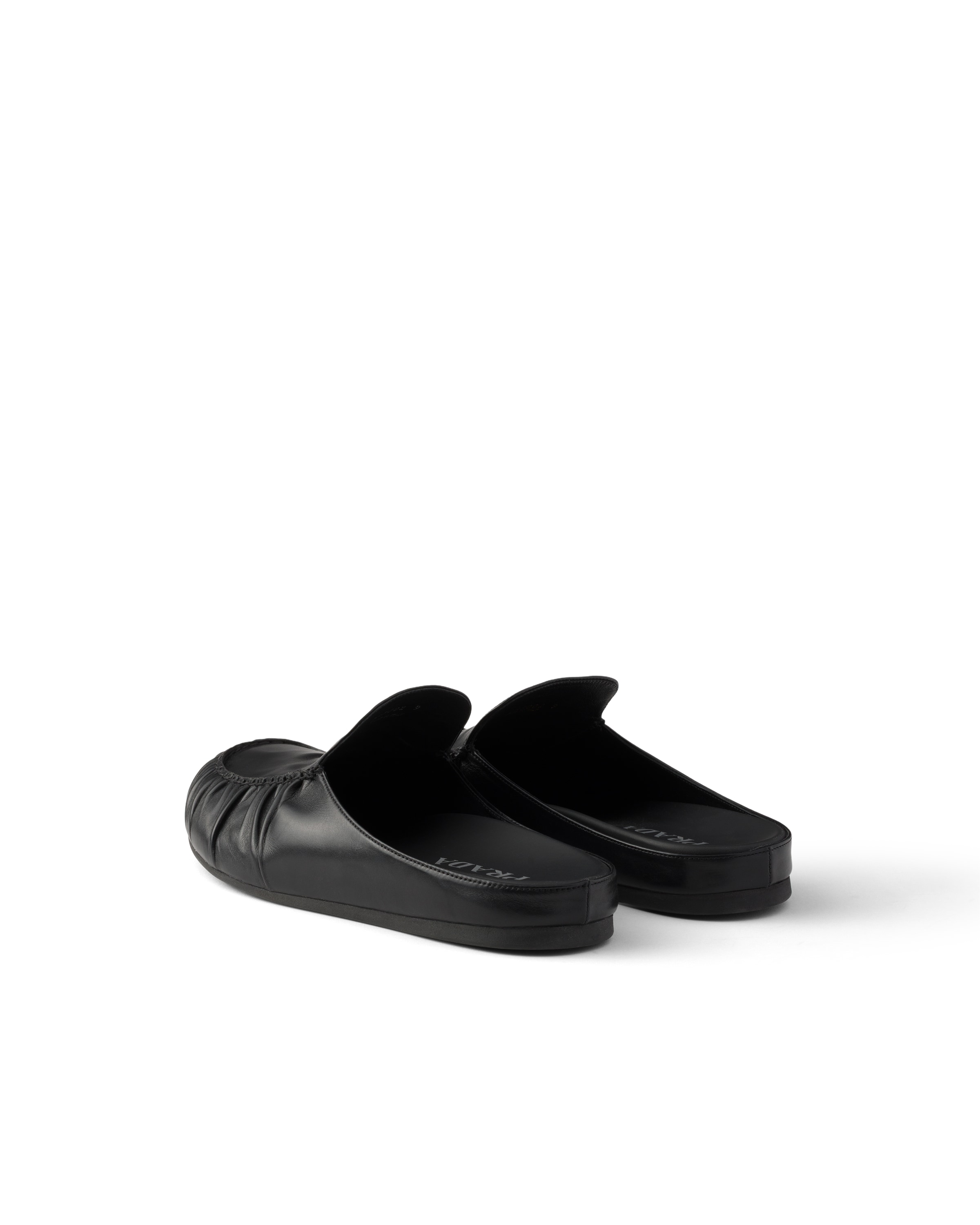 Prada Leather Mules In Black