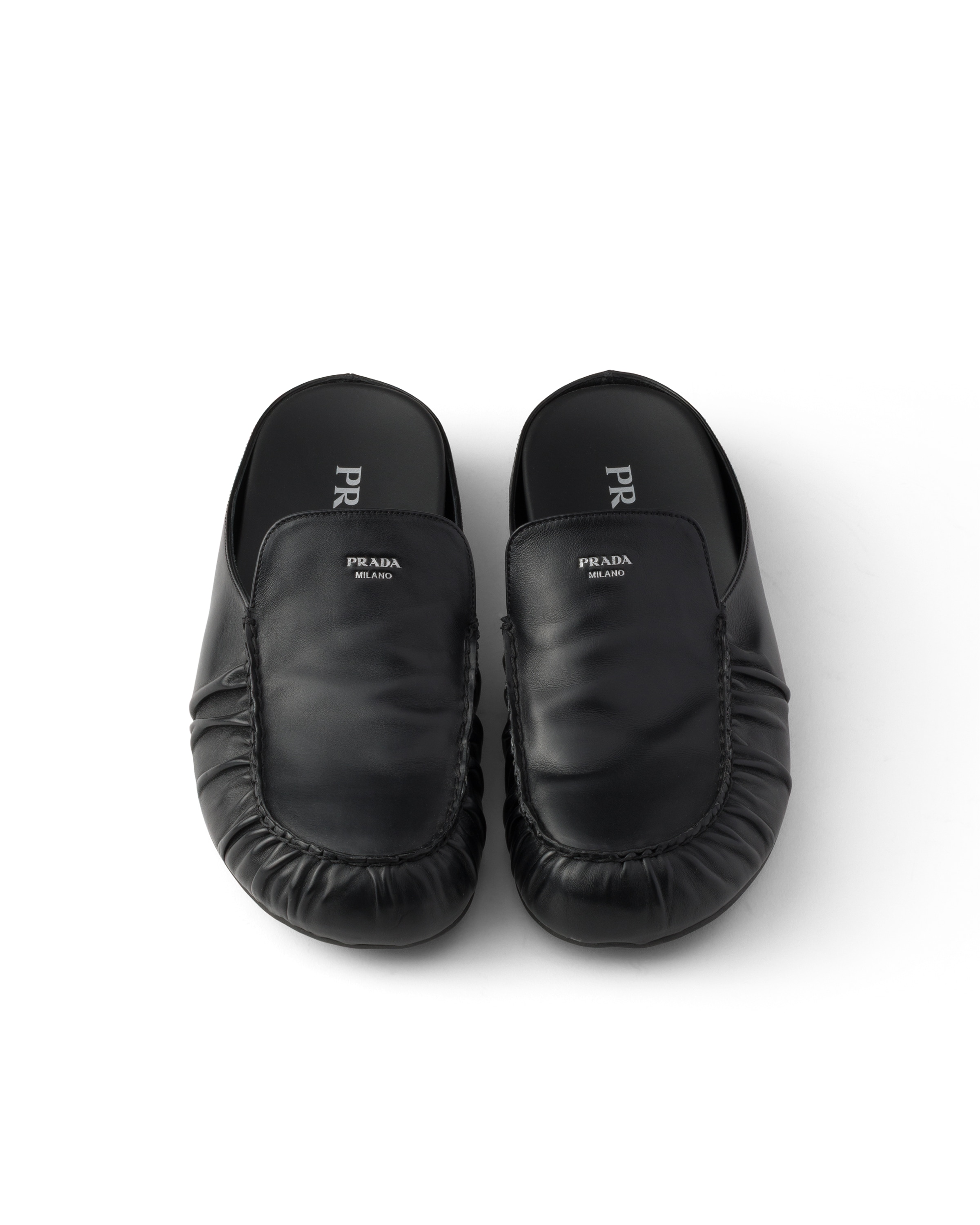 Prada Leather Mules In Black