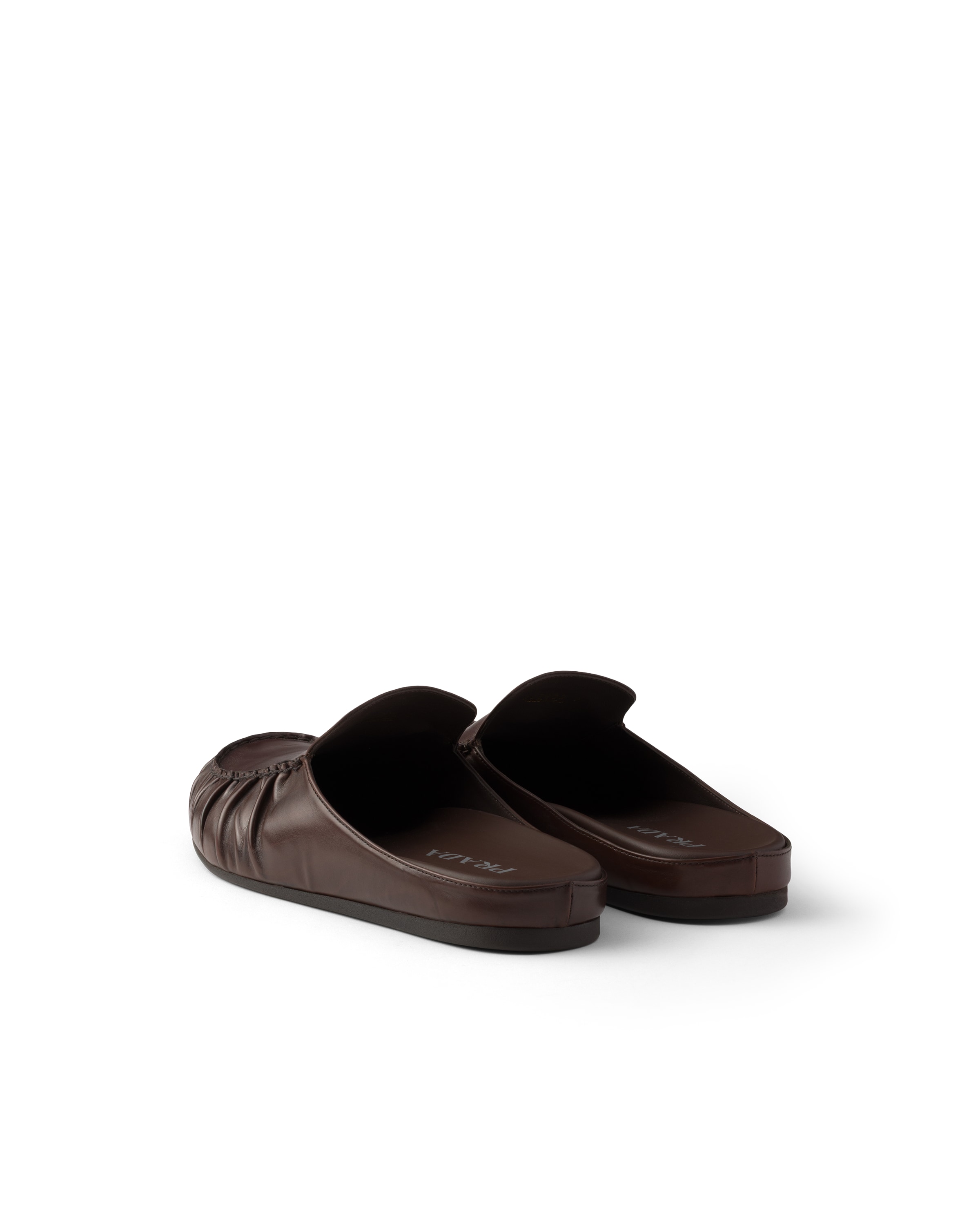 Prada Leather Mules In Brown