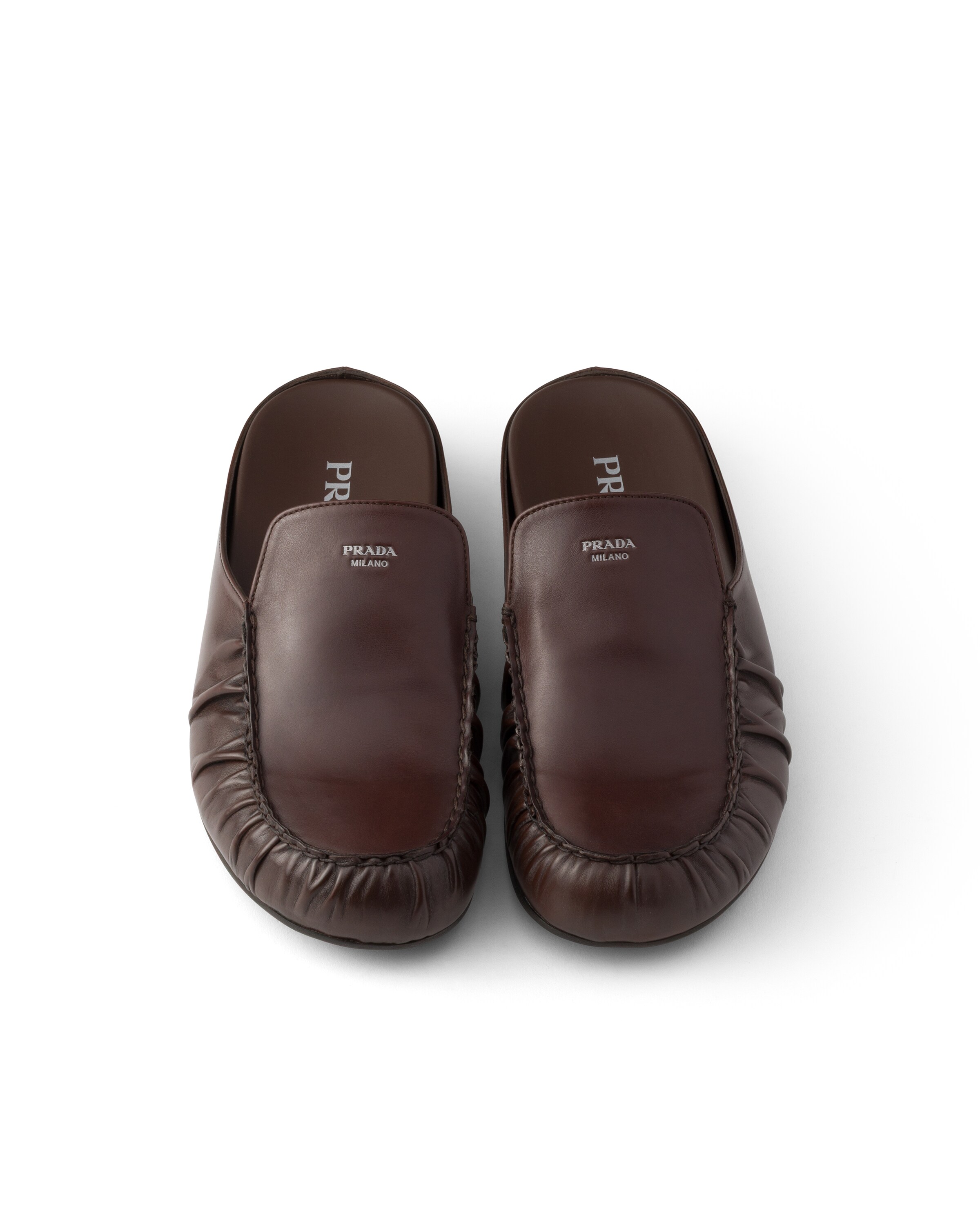 Prada Leather Mules In Brown