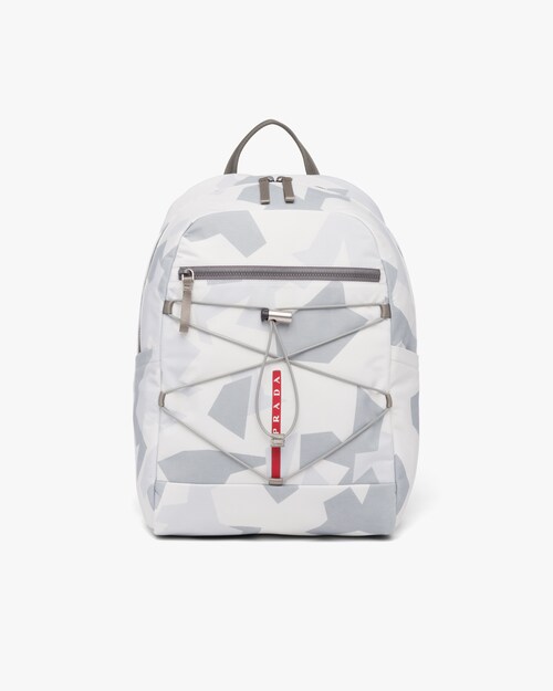 grey fabric backpack