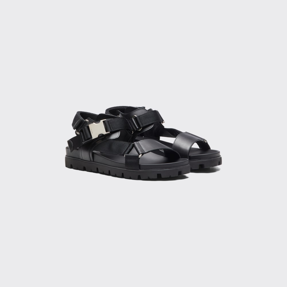 condoom condoom vergiftigen Black Sporty leather and nylon tape sandals | Prada