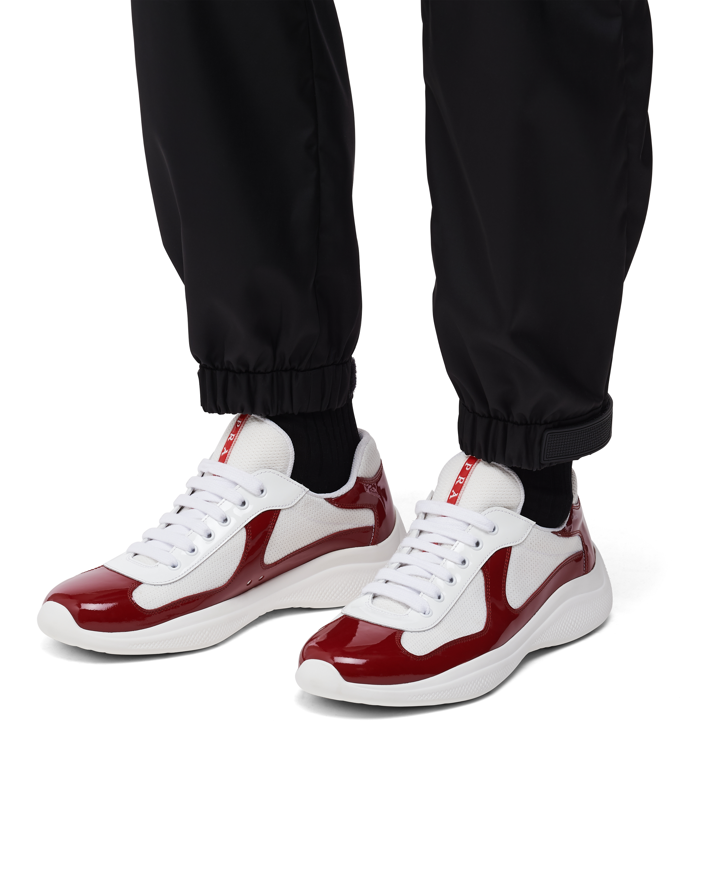 White and hotsell red prada sneakers