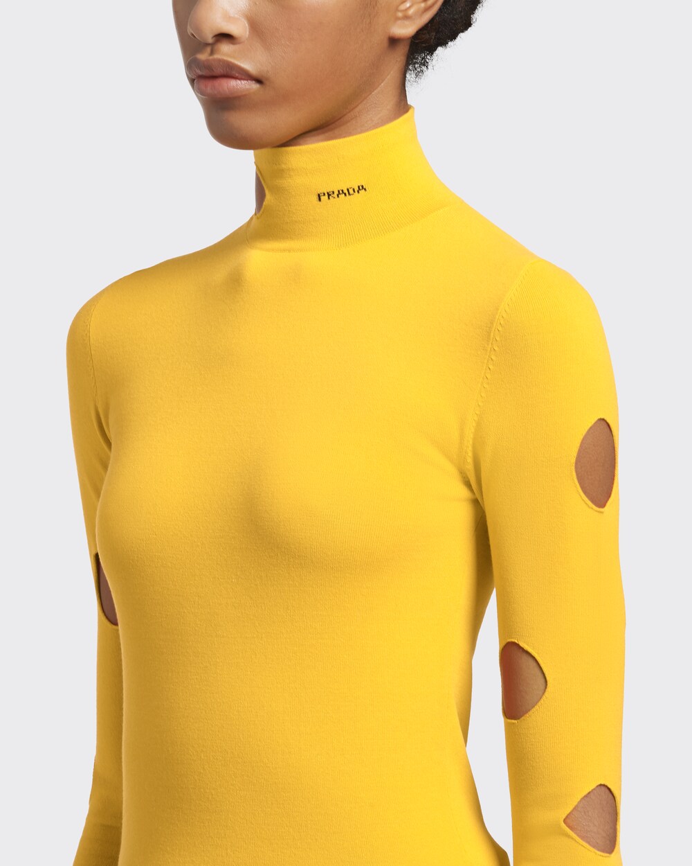 yellow turtleneck top