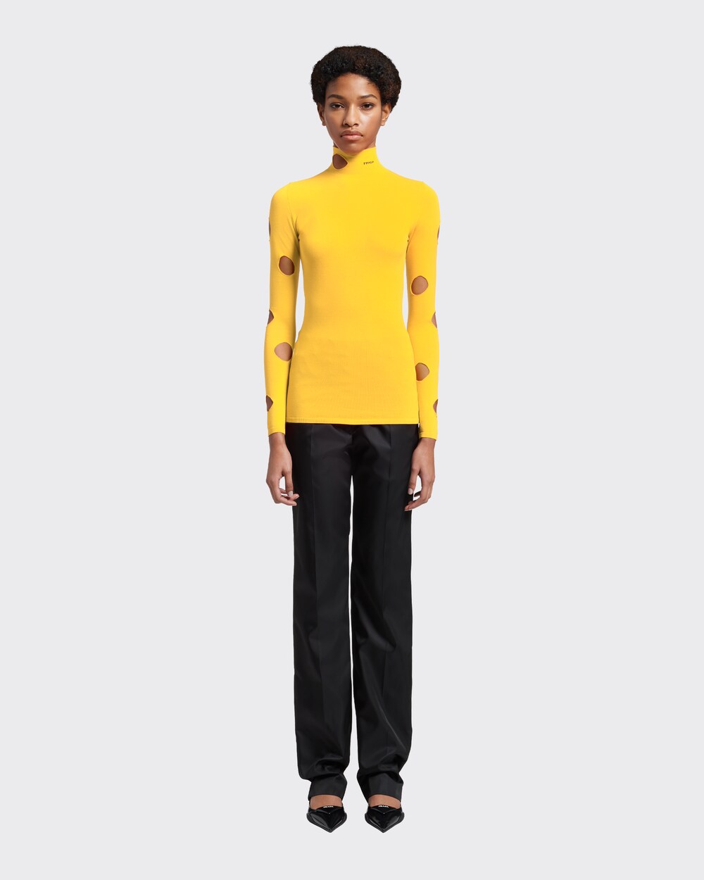 yellow turtleneck top
