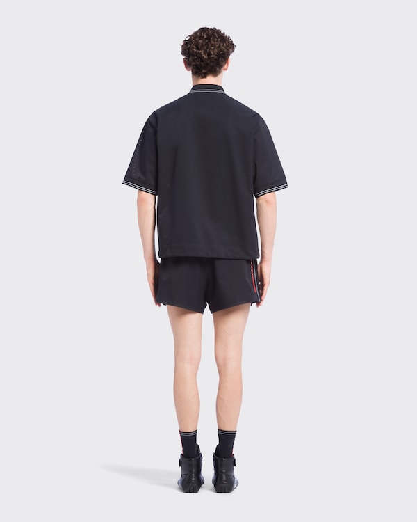 Poloshirt aus Bi-Stretch Light Poloshirt aus Bi-Stretch Light