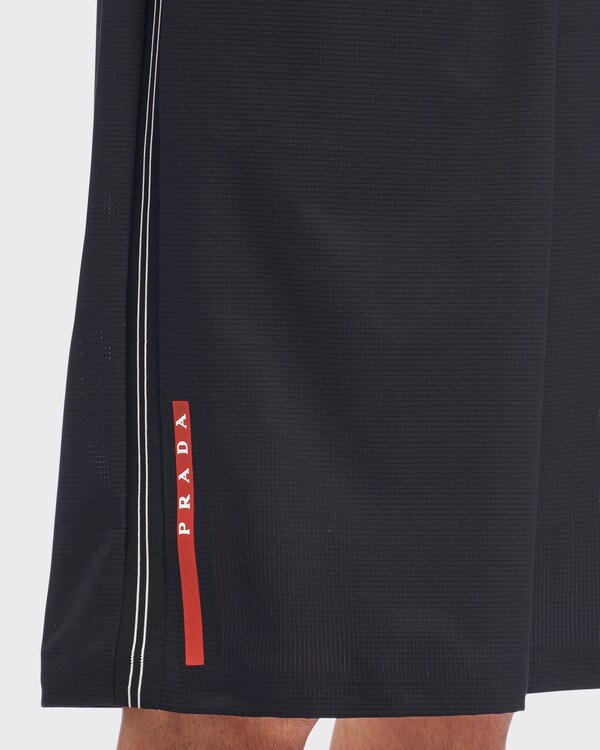 Bermuda en tissu technique stretch léger Bermuda en tissu technique stretch léger